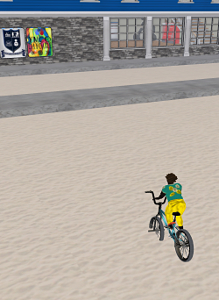 Shaka tests out a BMX bike in the sandy courtyard of what was once Little Minders and before that...