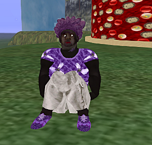 Shaka sits on the ground outside her red house on There is No Adult in the Room