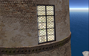 Iyoba peeks out of the top of the real four story light house at Black Basalt Beach