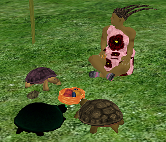 Iyoba sits with her shell family as they all enjoy dinner