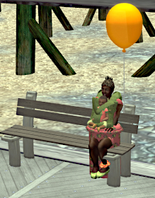 Iyoba and Petrichor sit on a bench in Weston, near Bay City